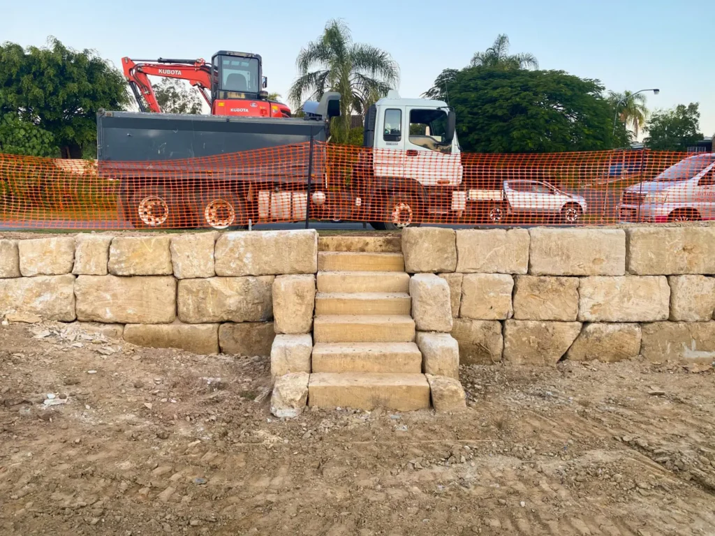 Sandstone Retaining wall with rough cut steps